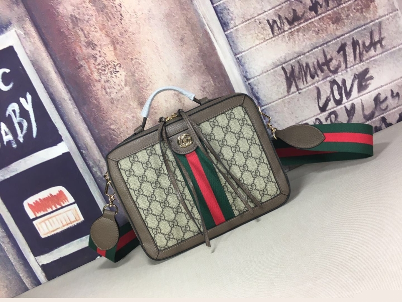 G*u*i top handle bags